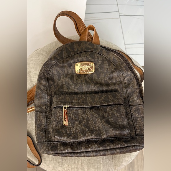 Michael Kors Brown Monogram Backpack with Gold Hardware - Picture 1 of 10